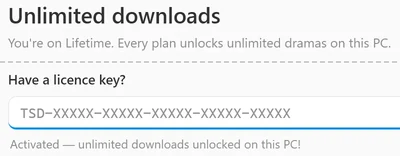 The Upgrade window right after a Lifetime key was activated: the line You’re on Lifetime. Every plan unlocks unlimited dramas on this PC. under Unlimited downloads, the empty key box, and under it Activated — unlimited downloads unlocked on this PC!